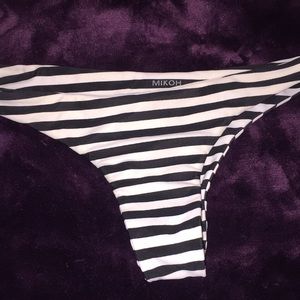 Black and white striped bikini bottoms.